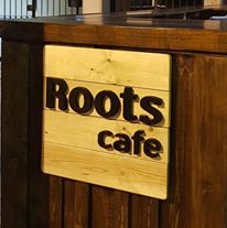 roots cafe btc atm spot